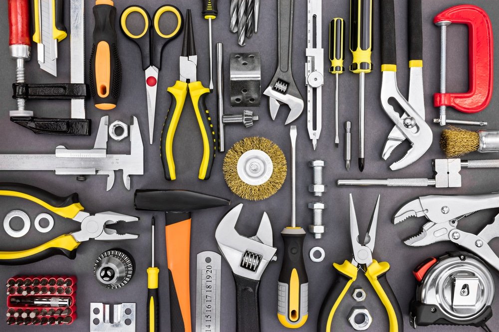 Set,Of,Hand,Various,Work,Tools,On,Grey,Background,Top